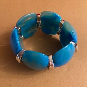 Vintage totally retro acrylic bracelet, beautiful turquoise colour.